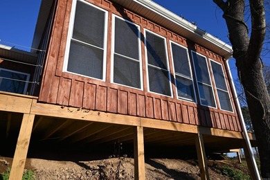 Situated on the banks of the beautiful, clear Caddo River, this - photo 33