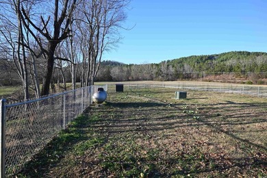 Situated on the banks of the beautiful, clear Caddo River, this - photo 35