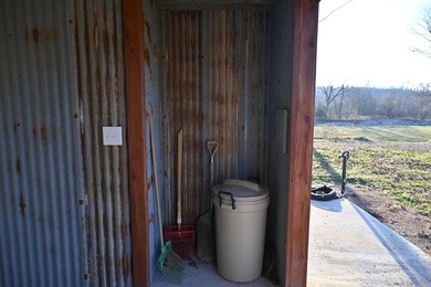 Situated on the banks of the beautiful, clear Caddo River, this - photo 41