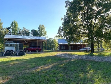 Situated on the banks of the beautiful, clear Caddo River, this - photo 43