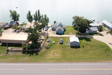 Wake up to sparkling water views and endless lake days at this - photo 1