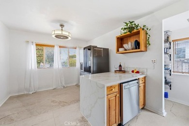 Welcome to this charming, fully updated home in the highly - photo 3