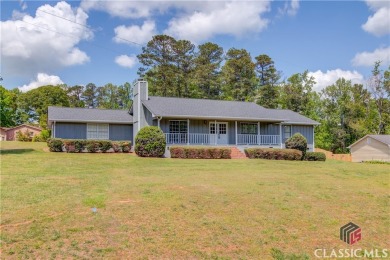 Lake Home For Sale in Oakwood, Georgia