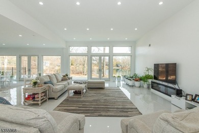 Step into this European-inspired lakefront masterpiece, built in - photo 6