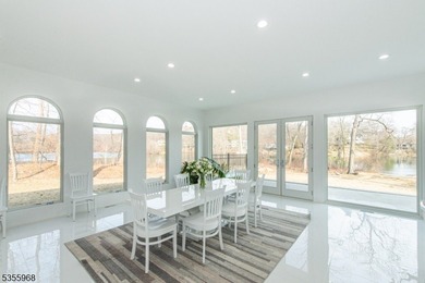 Step into this European-inspired lakefront masterpiece, built in - photo 8