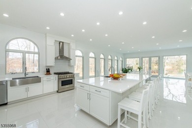 Step into this European-inspired lakefront masterpiece, built in - photo 10