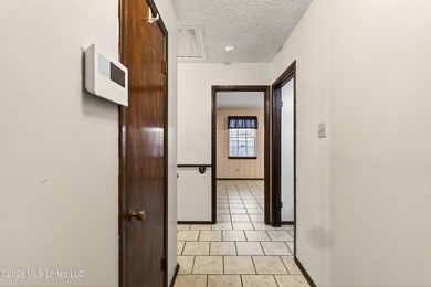 PRICED THOUSANDS BELOW APRRAISED VALUE... Located less than a - photo 12