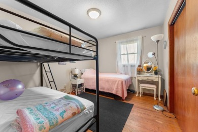 This solid 3 bedroom ranch sits on over an acre of rolling