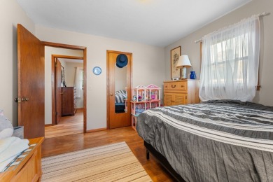 This solid 3 bedroom ranch sits on over an acre of rolling