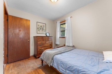 This solid 3 bedroom ranch sits on over an acre of rolling