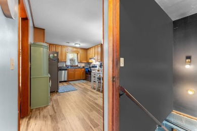 This solid 3 bedroom ranch sits on over an acre of rolling