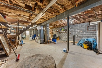 This solid 3 bedroom ranch sits on over an acre of rolling