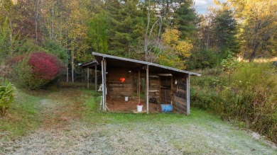 This solid 3 bedroom ranch sits on over an acre of rolling