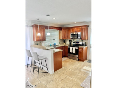 Enjoy the best of Cape Coral living in this beautifully located - photo 6