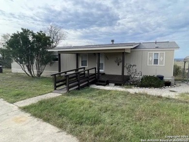 5 Acres + Single-Wide Manufactured Home in Medina Valley ISD!
