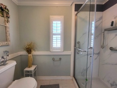 COASTAL ELEGANCE IN A PRIME LOCATION IN THE PARK! A beautiful - photo 28