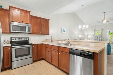 Welcome to this beautifully furnished third-floor condo located - photo 11