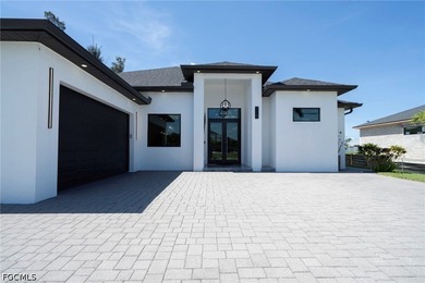 Welcome to this stunning modern luxury waterfront home featuring - photo 1