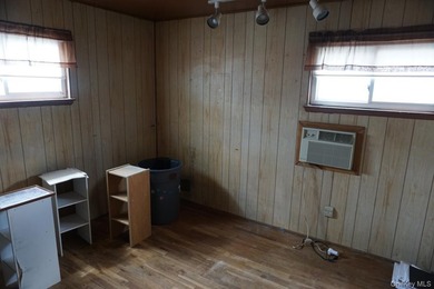 This split-level home in Lindenhurst features four spacious - photo 13
