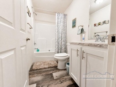 Experience an ideal blend of modern comfort and mountain living - photo 14