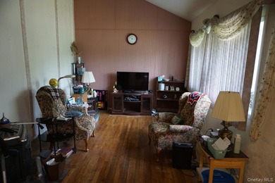 This split-level home in Lindenhurst features four spacious - photo 15