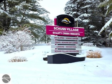 Comfortable in all seasons, this 2-bedroom condominium has