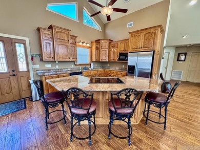 3,400+/- 4 BEDROOM, 3 BATH LAKEFRONT HOME WITH 2 BOAT SLIPS WITH - photo 18