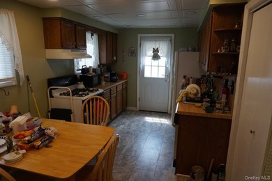 This split-level home in Lindenhurst features four spacious - photo 18
