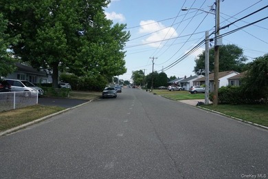 This split-level home in Lindenhurst features four spacious - photo 19