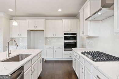 Built by EMC Homes GA, *Move-in Ready July 2026* *** $20,000 in - photo 10