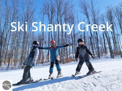 Comfortable in all seasons, this 2-bedroom condominium has