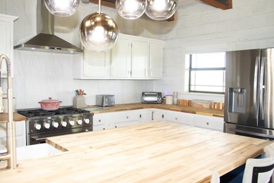 **Rate as low as 4.75% first year on 2/1 Buydown paid by Lender - photo 8