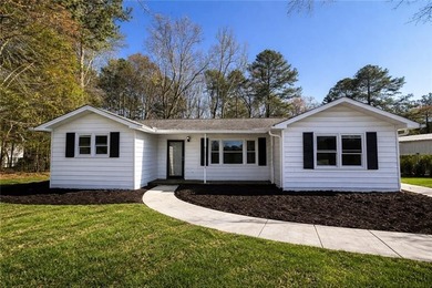 Discover this updated ranch style residence located in Tunnel