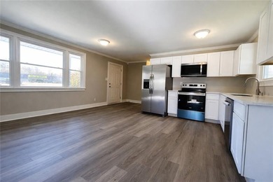 Discover this updated ranch style residence located in Tunnel