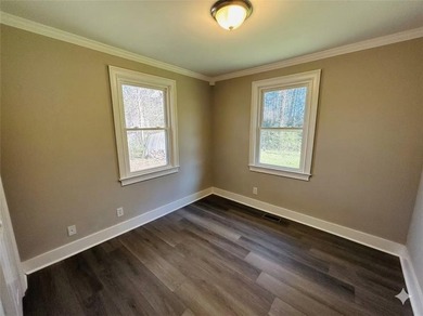 Discover this updated ranch style residence located in Tunnel