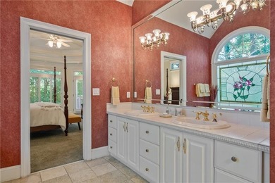 Welcome to this exceptional custom-built home in the prestigious - photo 18