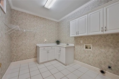 Welcome to this exceptional custom-built home in the prestigious - photo 32