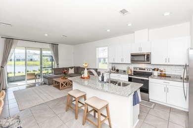 Welcome to this low-maintenance end-unit townhome featuring 3 - photo 4