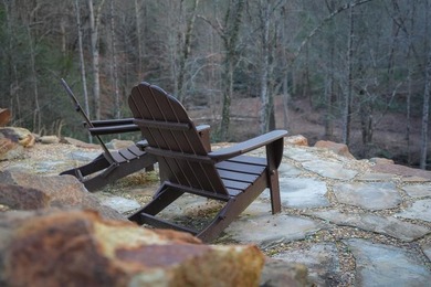 Set on 8.5 pristine acres, this extraordinary custom-built cabin