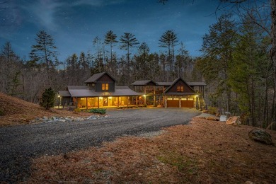 Set on 8.5 pristine acres, this extraordinary custom-built cabin