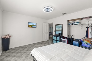 This renovated 2-bedroom, 2-bath condo has a newer roof (2022) - photo 11