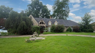 A rare opportunity to own a remarkable custom stone home - photo 1