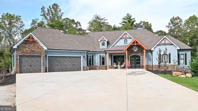 In the sought-after gated community Shores at Lynncliff Cove - photo 2
