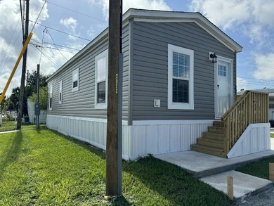 Make your new home in Palm Haven SP, a well-maintained - photo 3