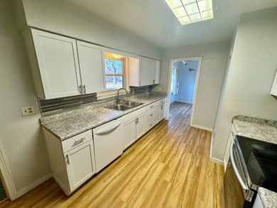 This 4-bedroom, 2-bathroom home, situated on a hilltop, offers