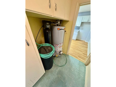 This 4-bedroom, 2-bathroom home, situated on a hilltop, offers