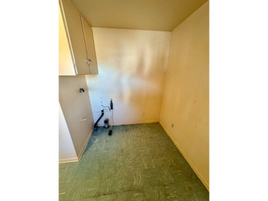 This 4-bedroom, 2-bathroom home, situated on a hilltop, offers