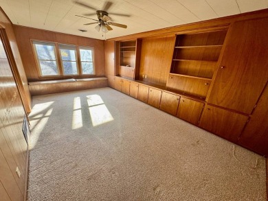 This 4-bedroom, 2-bathroom home, situated on a hilltop, offers