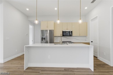 Experience luxury waterfront living in this brand-new - photo 8