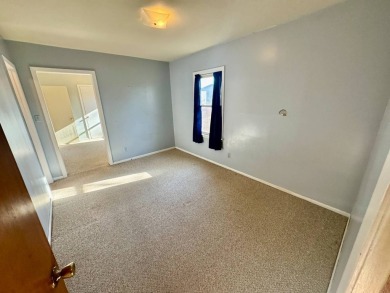 This 4-bedroom, 2-bathroom home, situated on a hilltop, offers